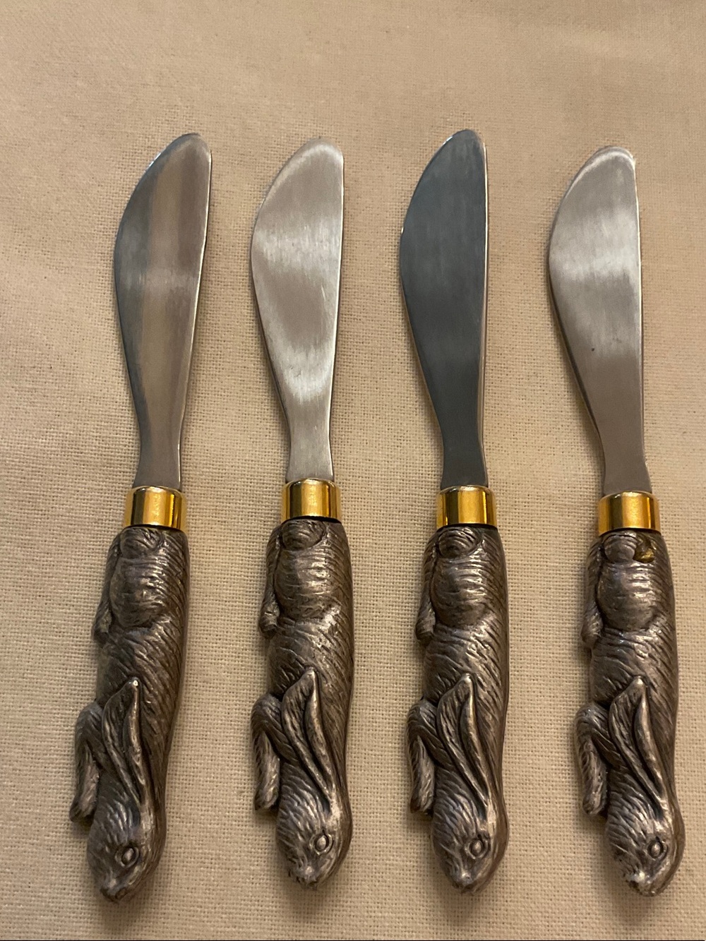 Set of 4 pewter BUNNY spreaders.  Great for Entertaining!  5”Stainless, like new